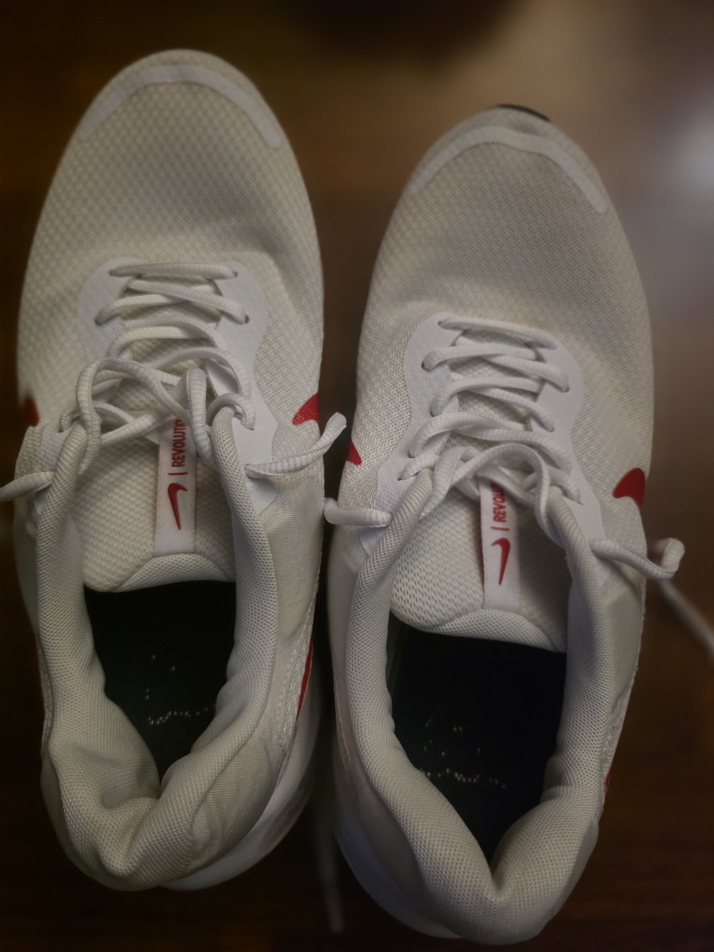 Nike Men’s White Running Shoes with Red Accent
